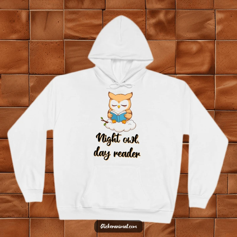 Funny owl book lover hoodie showing a cute owl character reading a book while resting on a cloud, radiating calm.