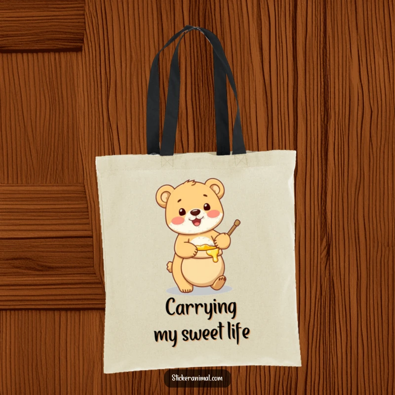 Funny tote bag showing a joyful bear cub balancing a pot brimming with honey, ready for a sweet adventure.