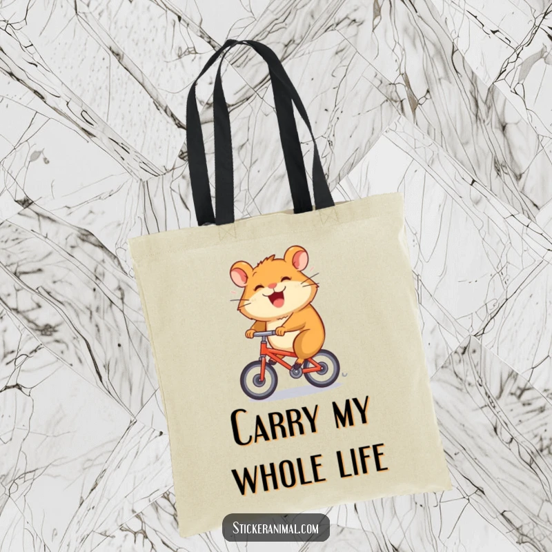 Funny tote bag features a grinning hamster character spinning rapidly on a tiny bicycle, great for on-the-go.