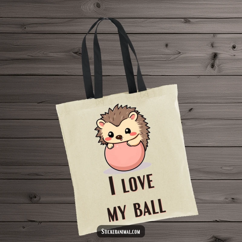 Funny hedgehog tote bag featuring a happy hedgehog rolled into a playful ball, perfect for carrying items with cute humor.